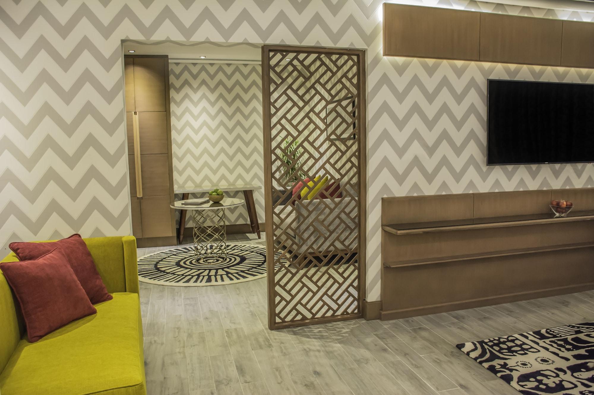 Radisson Blu Resort, Al Khobar ฮาล์ฟมูนเบย์ ภายนอก รูปภาพ A room divider in a living room